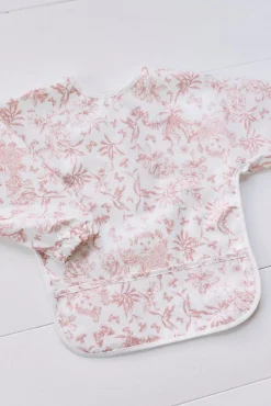 Bavoir à manches toile enduite Imprimé inspiration Toile de Jouy rose