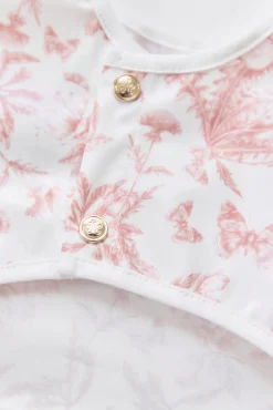 Bavoir à manches toile enduite Imprimé inspiration Toile de Jouy rose