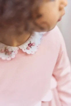 Robe Rose pâle plis religieux