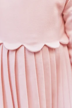 Robe Rose pâle plis religieux