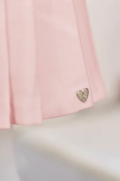 Robe Rose pâle plis religieux